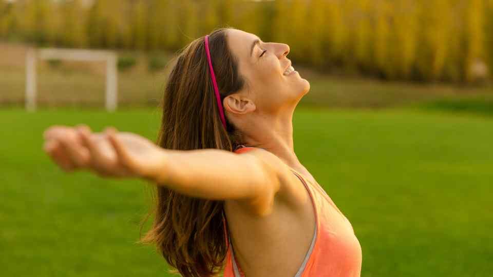 Woman celebrating weight loss success