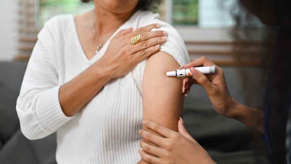Weight loss injection being administered into arm
