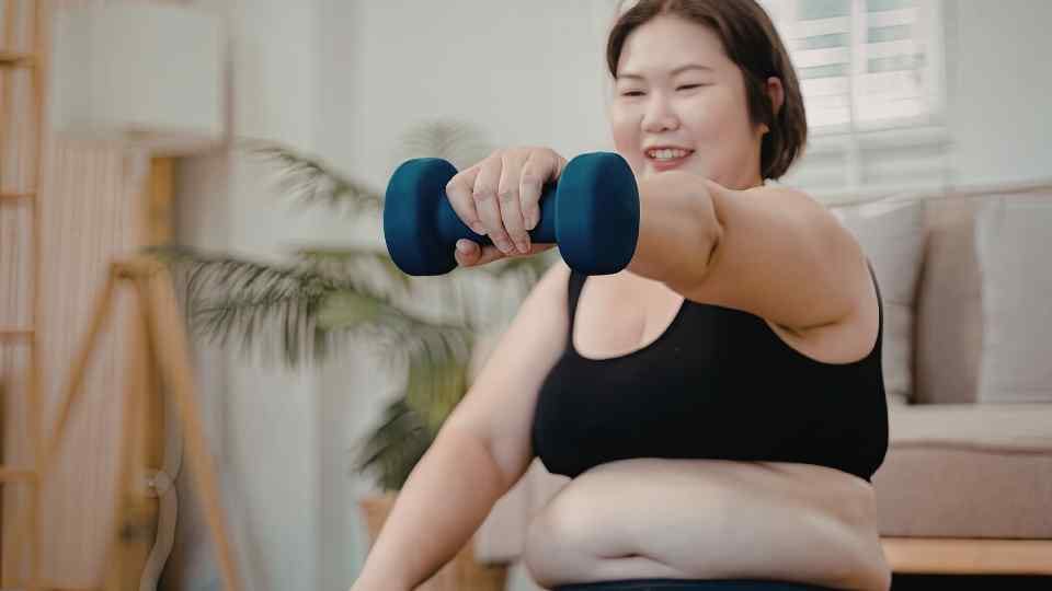 Woman exercising to support weight loss