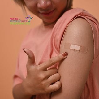 Vaccine plaster on arm